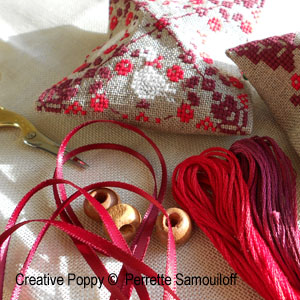 square cross stitch ornaments with ribbon tassels free tutorial